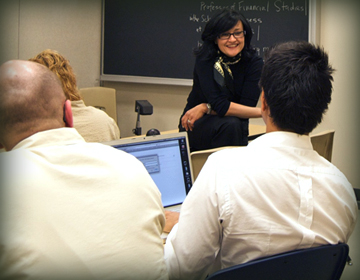 Faculty and students in class.