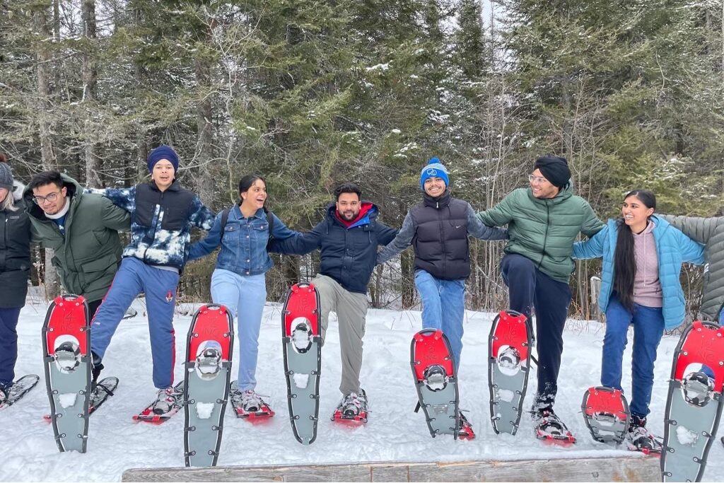 International students snowshoeing fun in winter